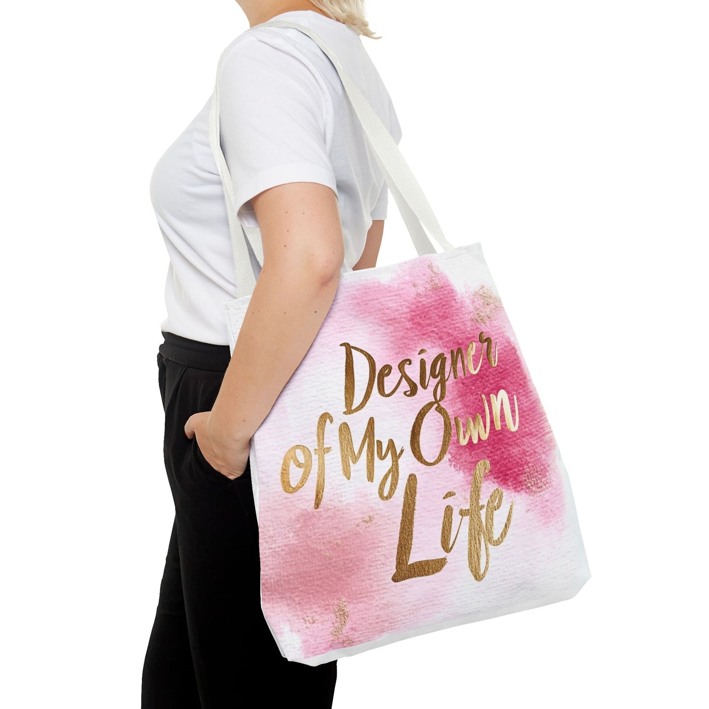 "DUO MODERN 'Designer Of My Own Life' Tote Bag in pink blush with gold font and white handle. Perfect for elegant, stylish women who take charge of their lives. Available in three sizes, blending style and functionality."