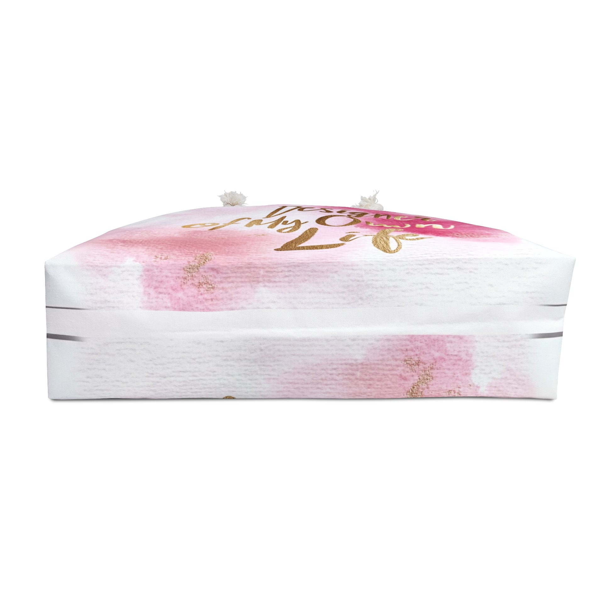 "DUO MODERN 'Designer of My Own Life' Weekender Tote in pink blush with gold font. Perfect for the modern jet-setter, combining elegance and practicality. Ideal for beach trips, luxe getaways, or city exploration."