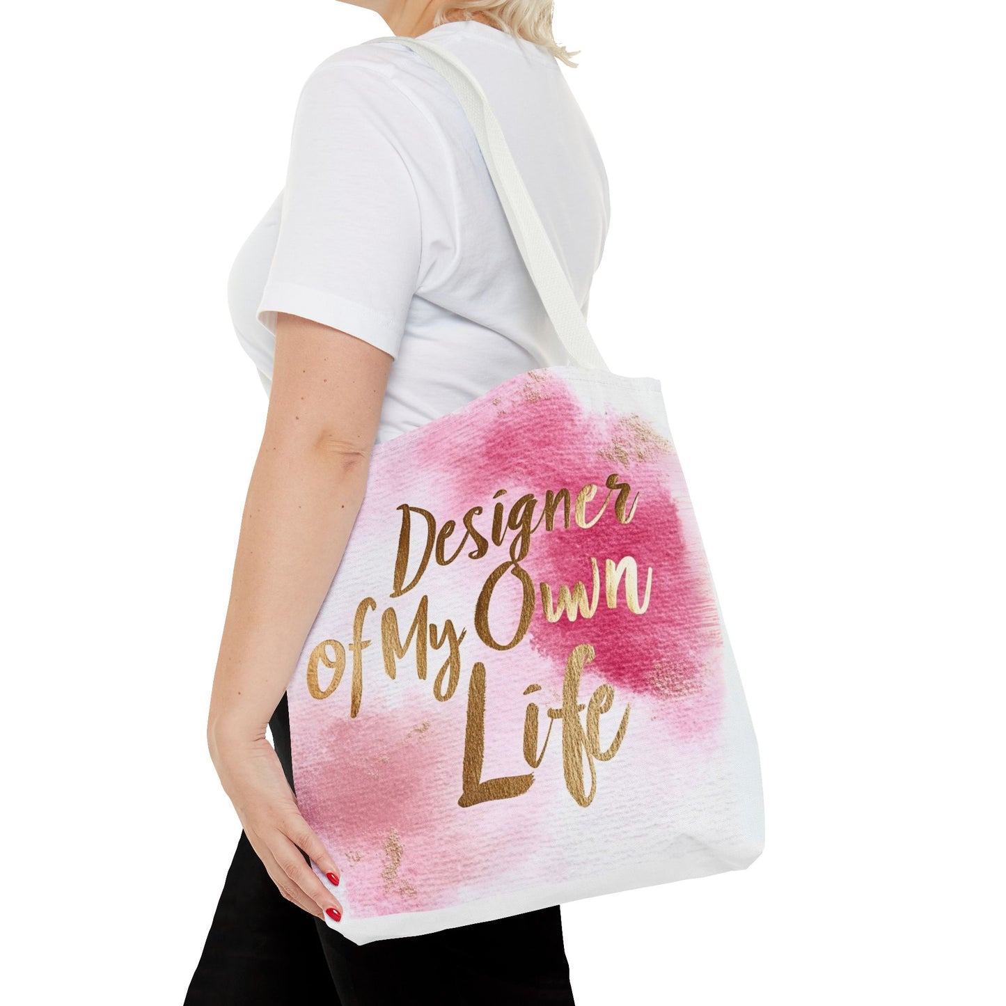 "DUO MODERN 'Designer Of My Own Life' Tote Bag in pink blush with gold font and white handle. Perfect for elegant, stylish women who take charge of their lives. Available in three sizes, blending style and functionality."
