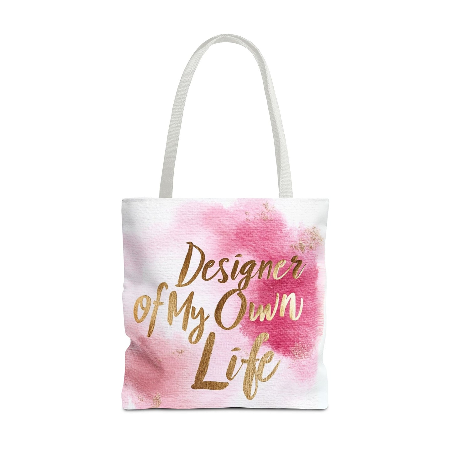 "DUO MODERN 'Designer Of My Own Life' Tote Bag in pink blush with gold font and white handle. Perfect for elegant, stylish women who take charge of their lives. Available in three sizes, blending style and functionality."