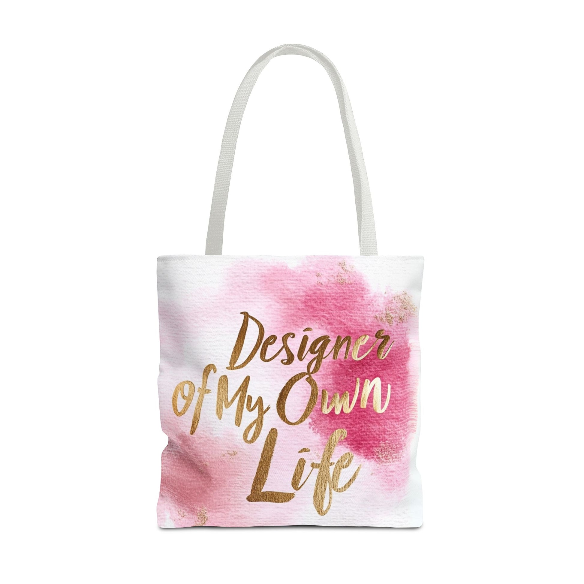 "DUO MODERN 'Designer Of My Own Life' Tote Bag in pink blush with gold font and white handle. Perfect for elegant, stylish women who take charge of their lives. Available in three sizes, blending style and functionality."