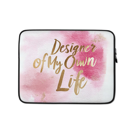 "DUO MODERN 'Designer Of My Own Life' Laptop Sleeve with elegant pearlescent white script and gold underline on blush canvas. Features faux fur-lined interior, padded zipper, and water, oil, and heat-resistant exterior. Stylish and protective for work, travel, or everyday use."