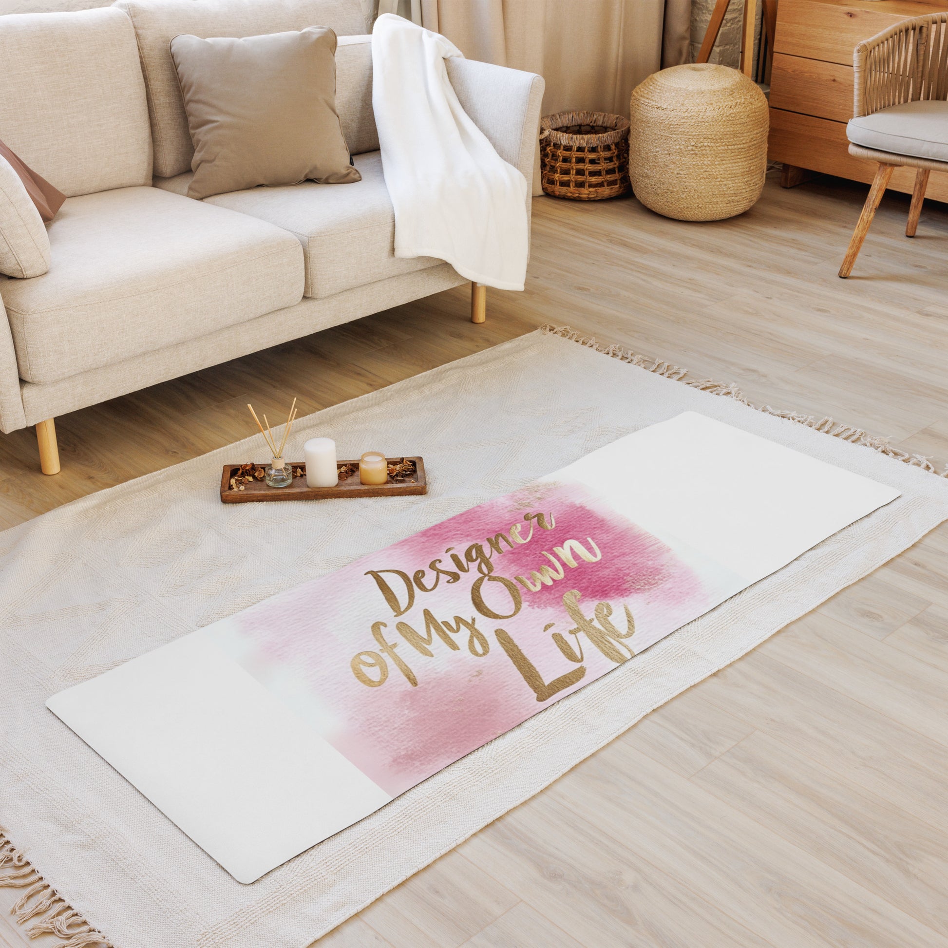 "DUO MODERN 'Designer of My Own Life' Yoga Mat in pink blush with gold font. Perfect for exercise, meditation, or stretching. Offers stability, comfort, and portability. Enhances your practice with style and functionality."